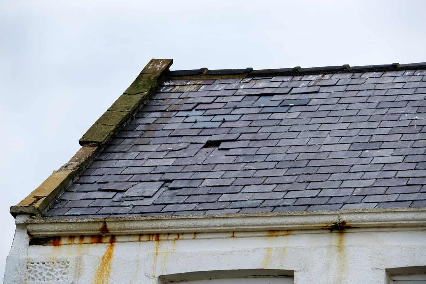 how old is your roof missing and broken shingles on old home