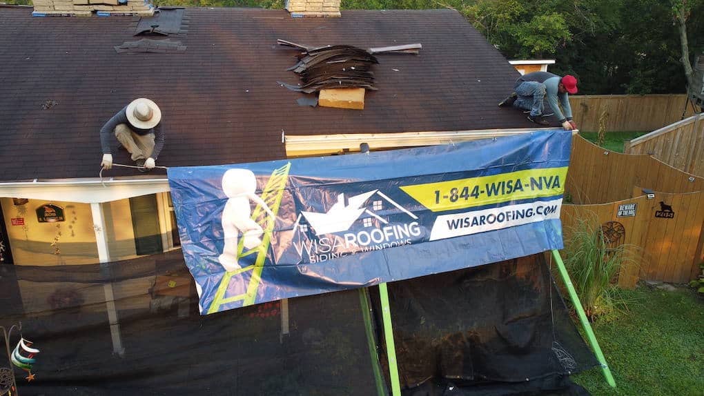 wisa banner on newly installed roof; how to get insurance to pay for roof replacement