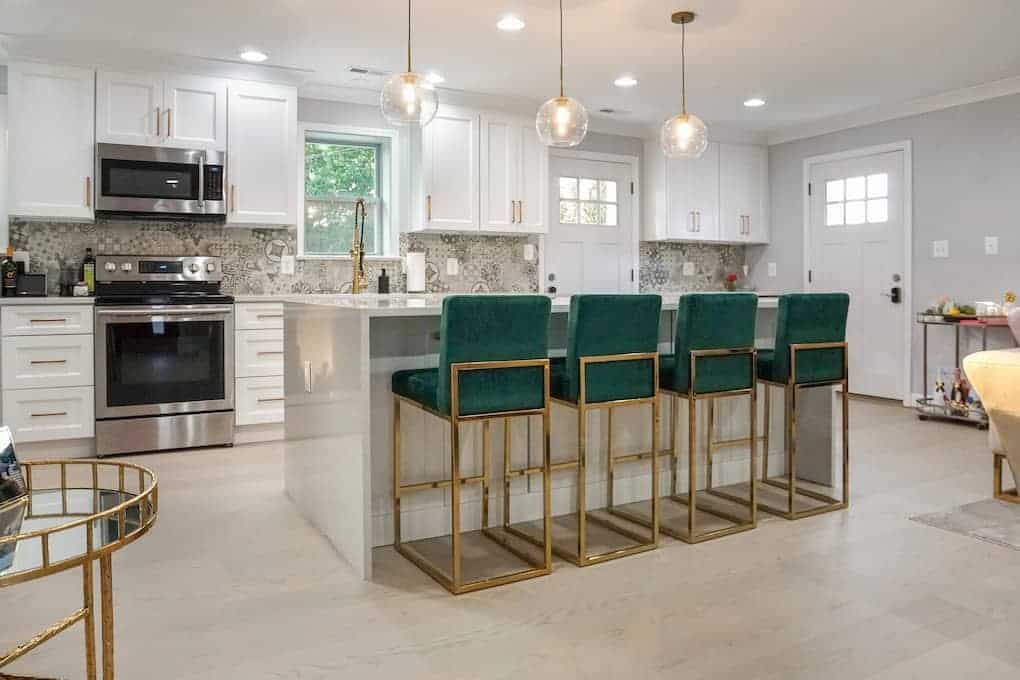 modern kitchen with island countertop and stools; kitchen remodeling ideas