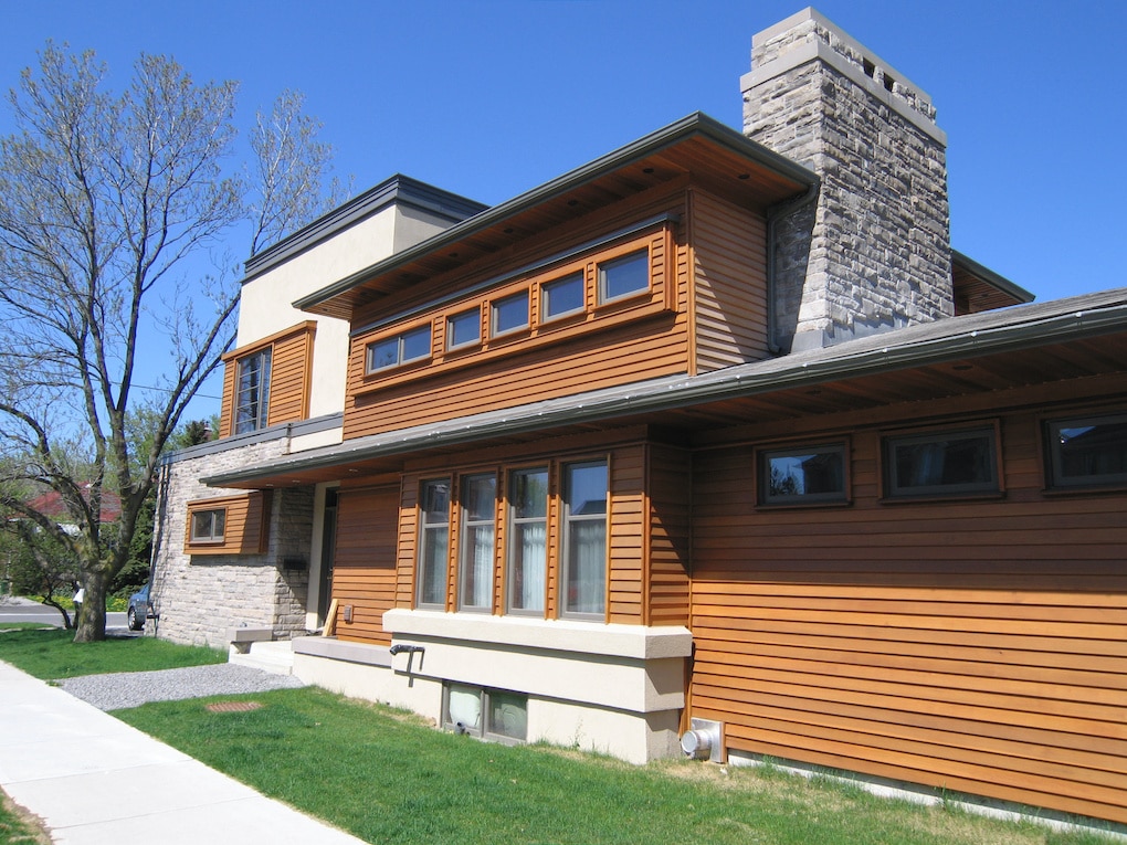 modern house with multiple siding options including wood